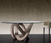 Round table with granite base and glass surface. All-Italian production
